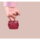 Illustration for article titled Coach Unveils Petite Handbag For Holding Fingernails, Skin Flakes, And Other Loose Detritus You Pull Off Your Body